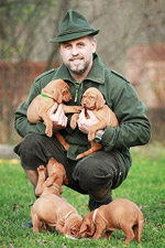 Pavel Unverdorben with puppies